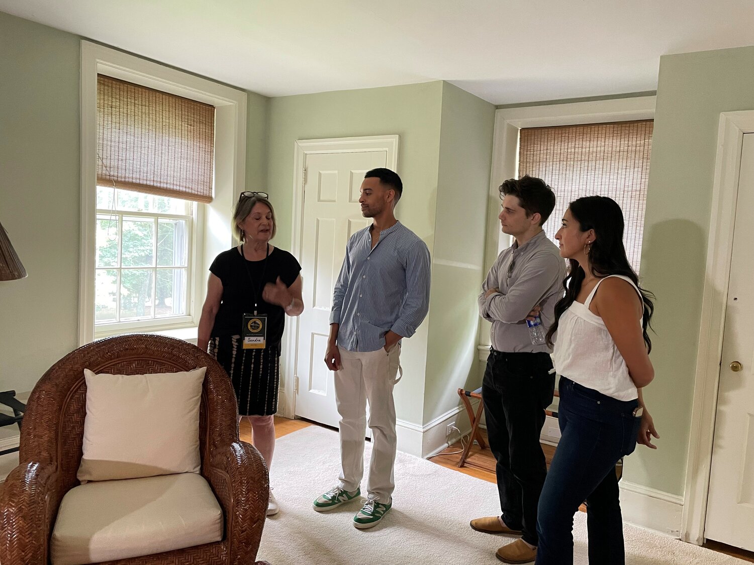Sandy Gerger, a tour guide at the Oscar Hammerstein Museum and Theatre Education Center, tells “Tick, Tick...Boom!” cast members Noah J. Ricketts, Krystina Alabado and Andy Mientus about Highland Farm’s history.
