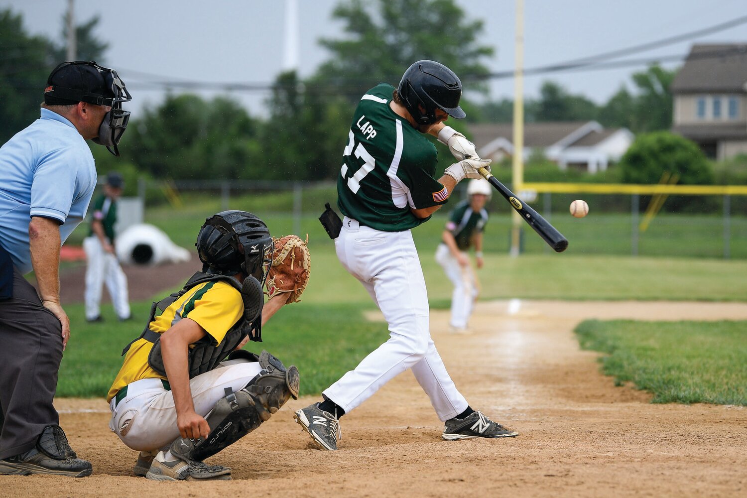 Pennridge’s Nate Lapp connects for an RBI in the fourth inning of Game 1 of Sunday’s doubleheader.