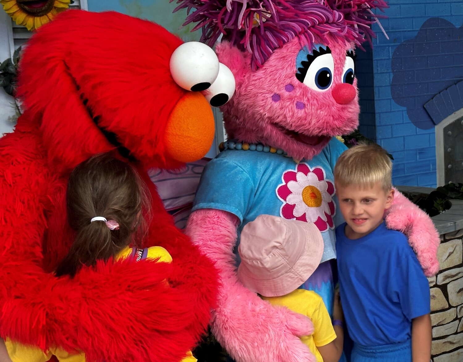 Sesame characters Elmo and Abby Cadabby greet Ukrainian refugees at the Middletown theme park on World Refugee Day June 21.