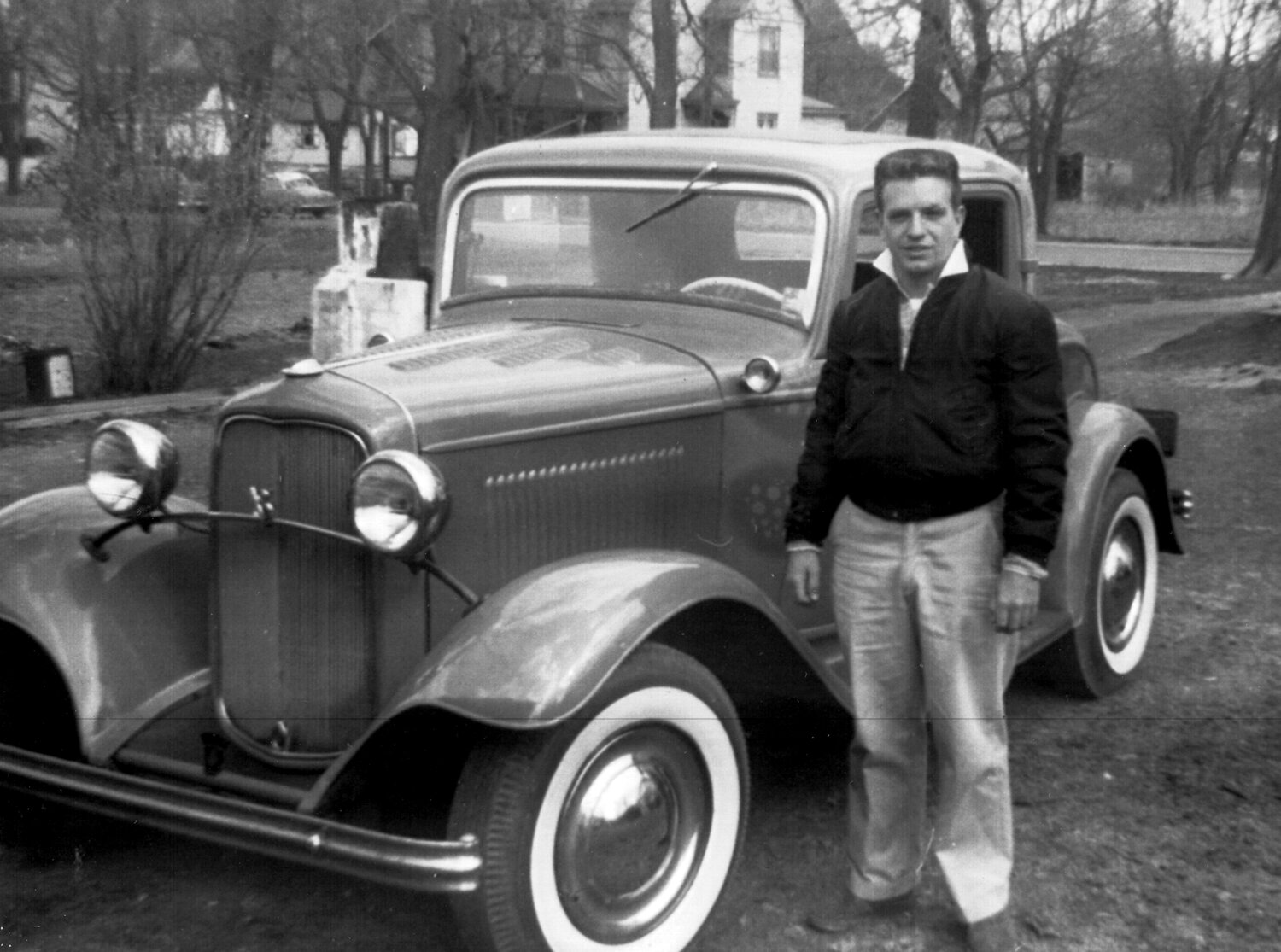 Dicks Hines poses next to his 1932 Ford in Chalfont. The photograph is part of John Abbott's "A Nostalgic Oral History of Chalfont."