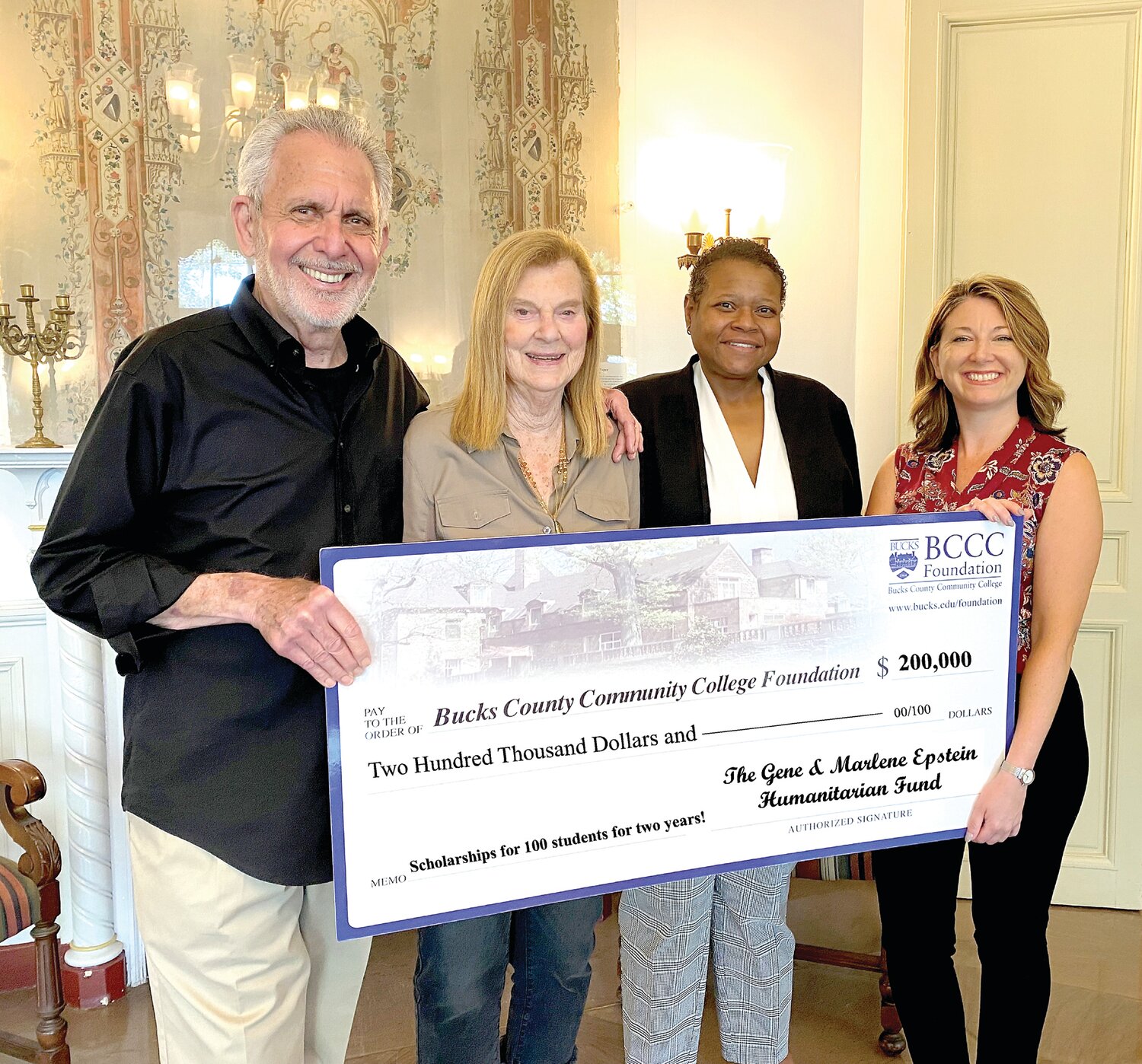 (From left) Gene Epstein and Marlene Epstein present a check to Bucks County Community College President Dr. Felicia L. Ganther, and Christina Kahmar, the executive director of the Bucks County Community College Foundation and Interim AVP, Advancement on July 6 at Tyler Hall on Bucks County Community College’s Newtown Campus.