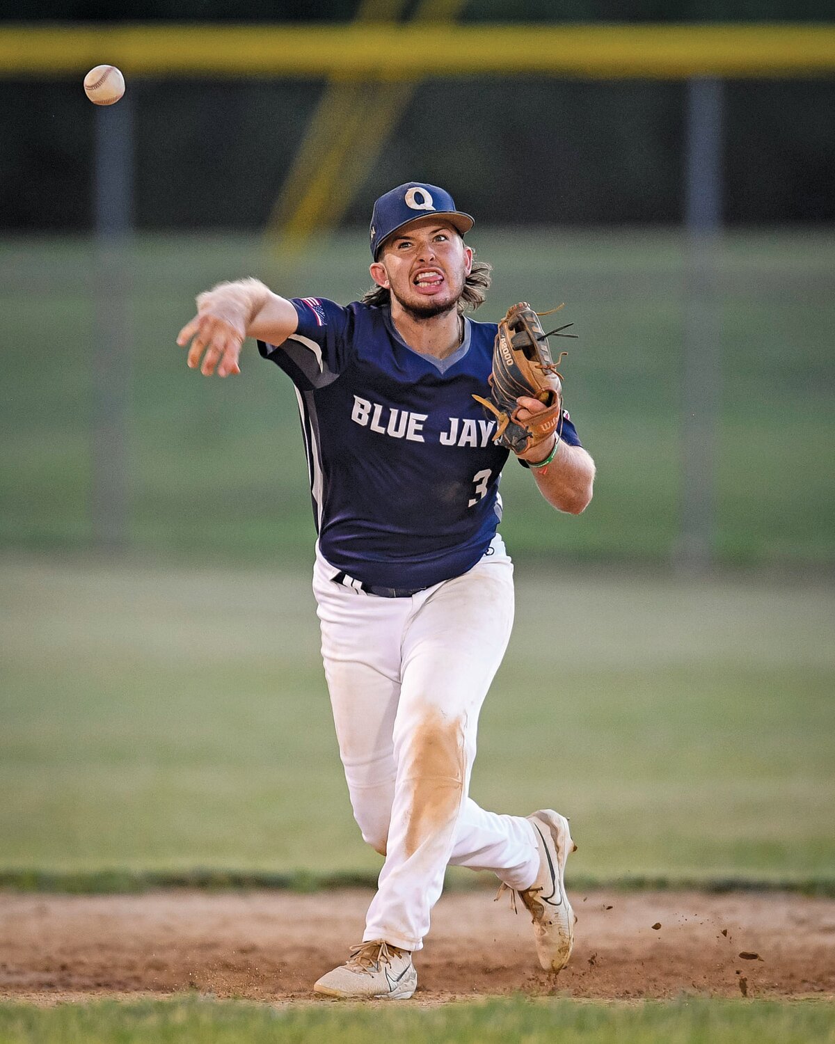 Quakertown shortstop Ty Everett fires across the field for an out during the bottom of the second.