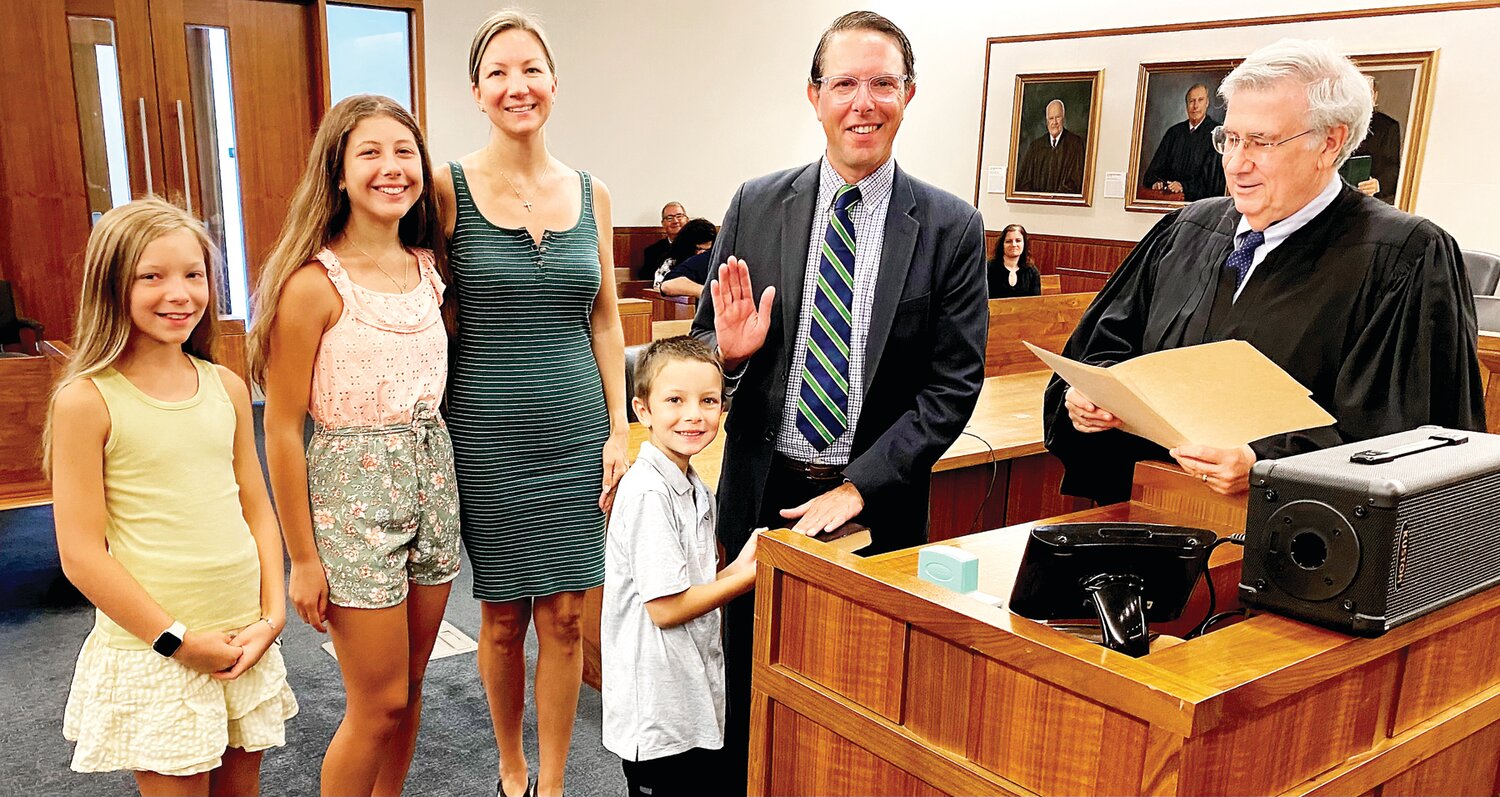Dr. Matthew Friedman is sworn in as the next superintendent of the Quakertown Community School District on July 5. President Judge Wallace H. Bateman Jr., right, presided over the swearing-in at the Bucks County Justice Center. He is standing next to Friedman and his family, son Ethan, wife Rebecca, and daughters Hannah and Rachel.