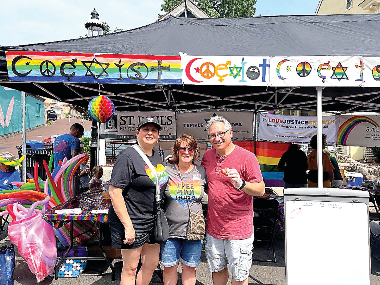Becky Bernstein, Shari Wohl and Jerel Wohl of Temple Judea were on hand at the block party as part of a contingent from the Bucks County temple that handed out rainbow bagels with a schmear at the event.