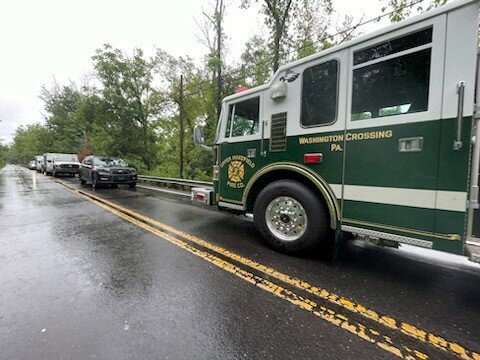 Fire crews from Washington Crossing aid in the search for flood victims in Upper Makefield Sunday.