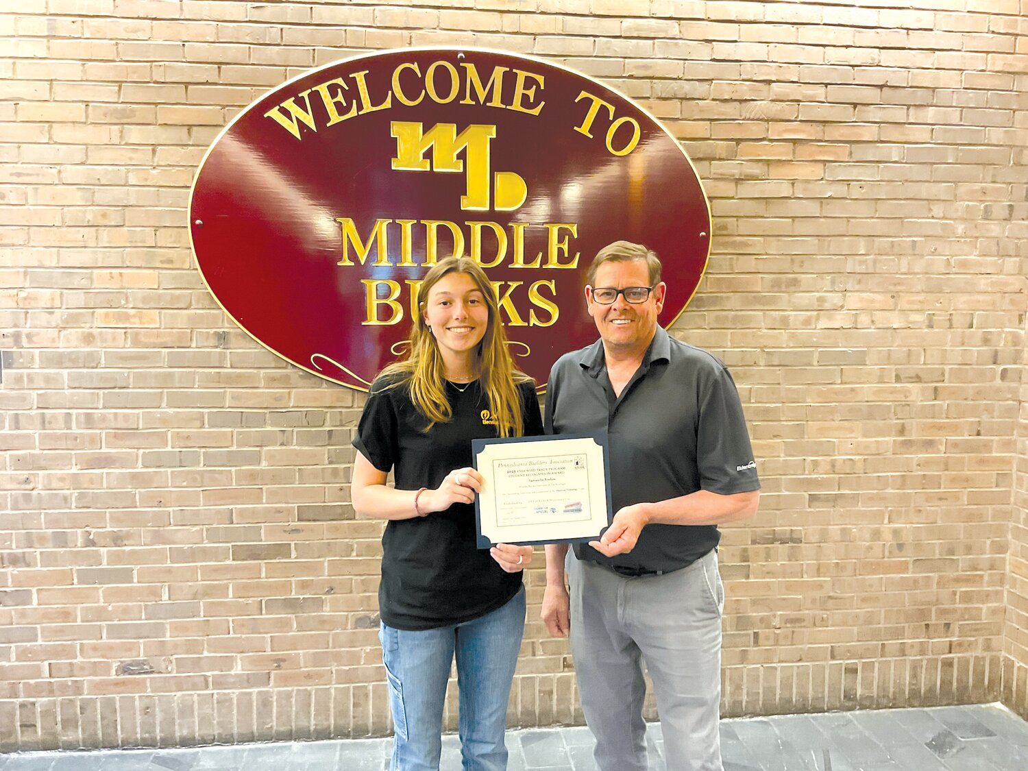 Middle Bucks Institute Technology  electrical technology student Samantha Bredow and Randy McDowell, electrical technology instructor.