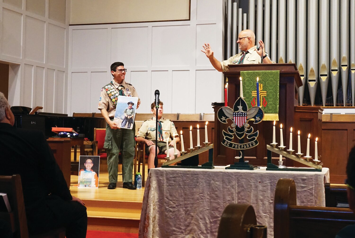 Eric Simon, left, receives the Eagle Scout Award in a ceremony on June 17. Simon is the 50th Scout from Troop 48 of Doylestown to attain the Eagle rank.