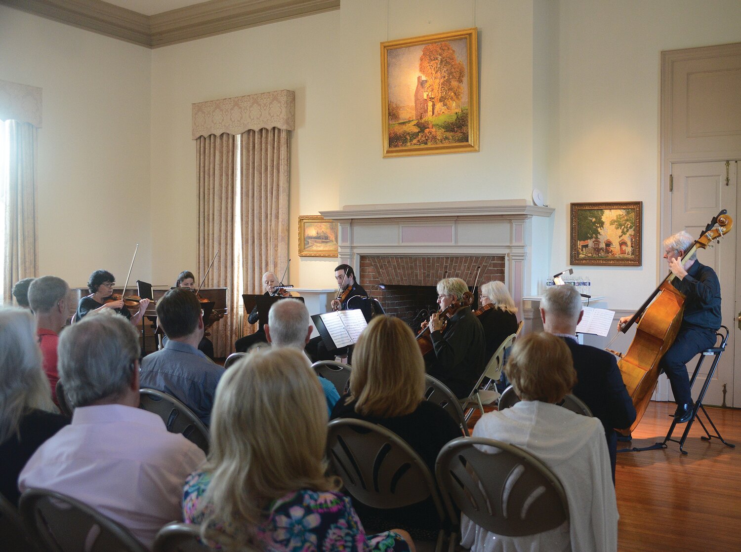 Chamber musicians from the Bucks County Symphony Orchestra perform for guests at the Mercer Museum.