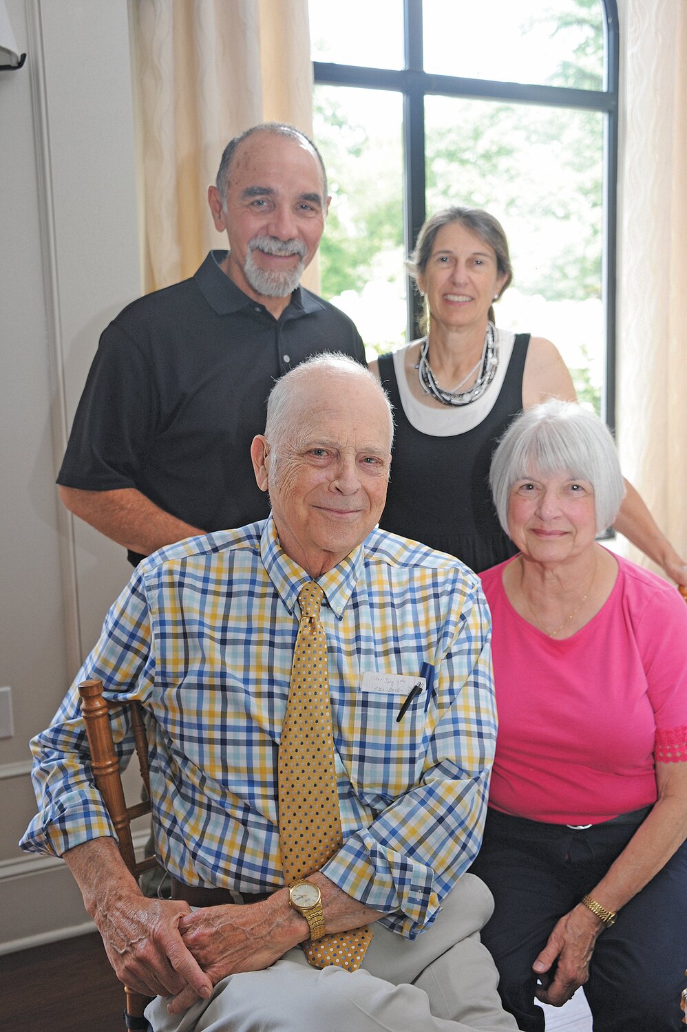 Carl and Diane Mill, standing, and Bill and Anne Bishop, sitting.