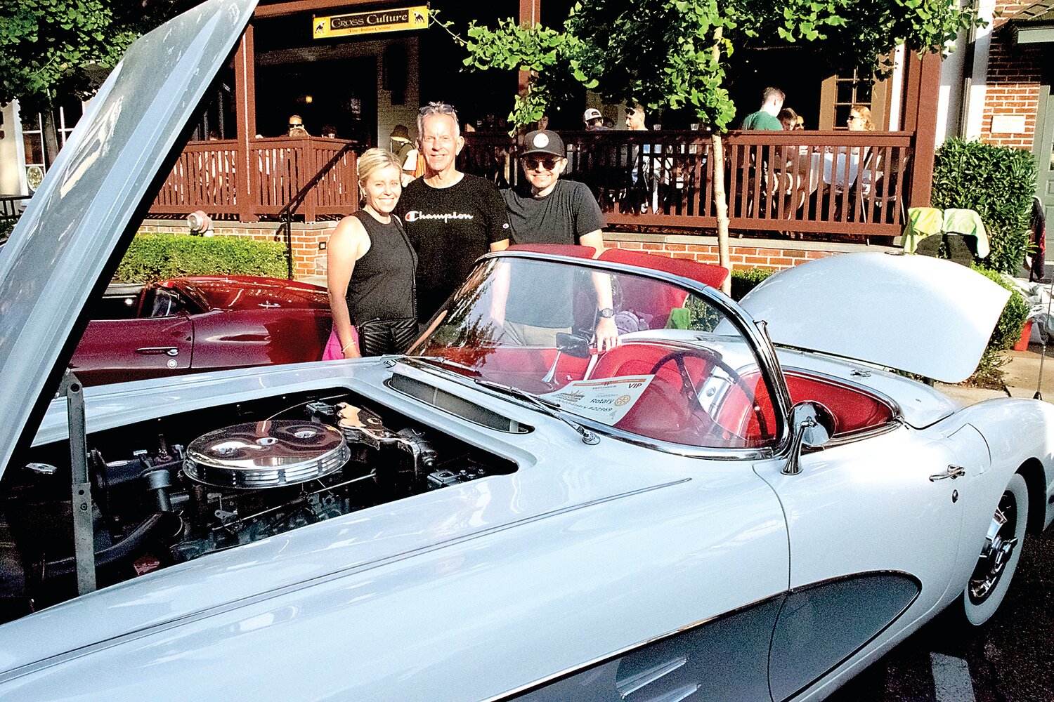 Bill Rowe with his family and his 1959 Corvette, one of the Top 40 Award winners.