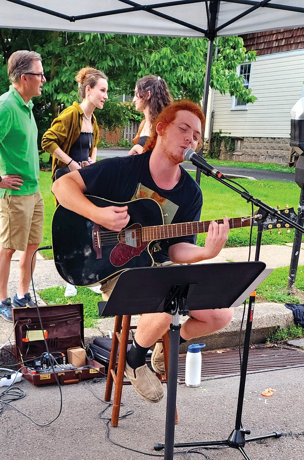 Doylestown native Tyler Beck plays for the crowds on West State and Franklin streets.