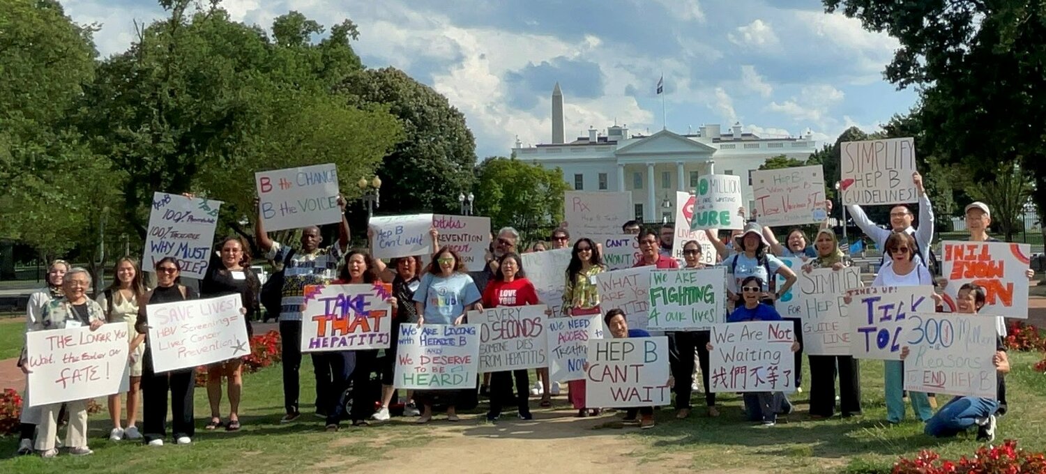 Hep B United partners hosted an awareness event in front of the White House, carrying signs including “We Are Fighting 4 Our Lives” and “Hep B Can’t Wait.”