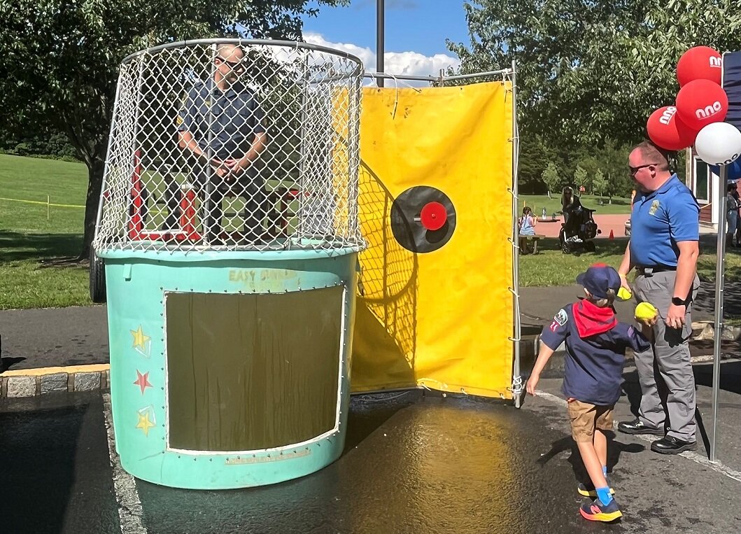 The chance to dunk a local police officer was just one of the activities at Tuesday’s National Night Out in Doylestown Township.