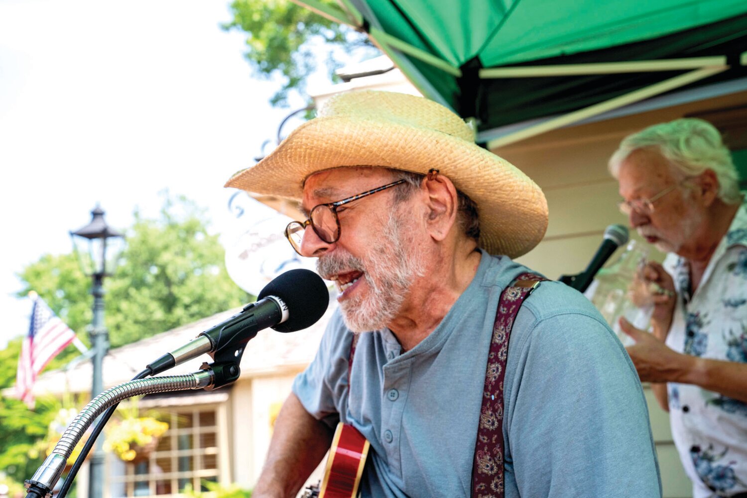 The Back Porch Jugband plays music to liven the atmosphere at Peddler’s Village’s 2023 Peach Festival.
