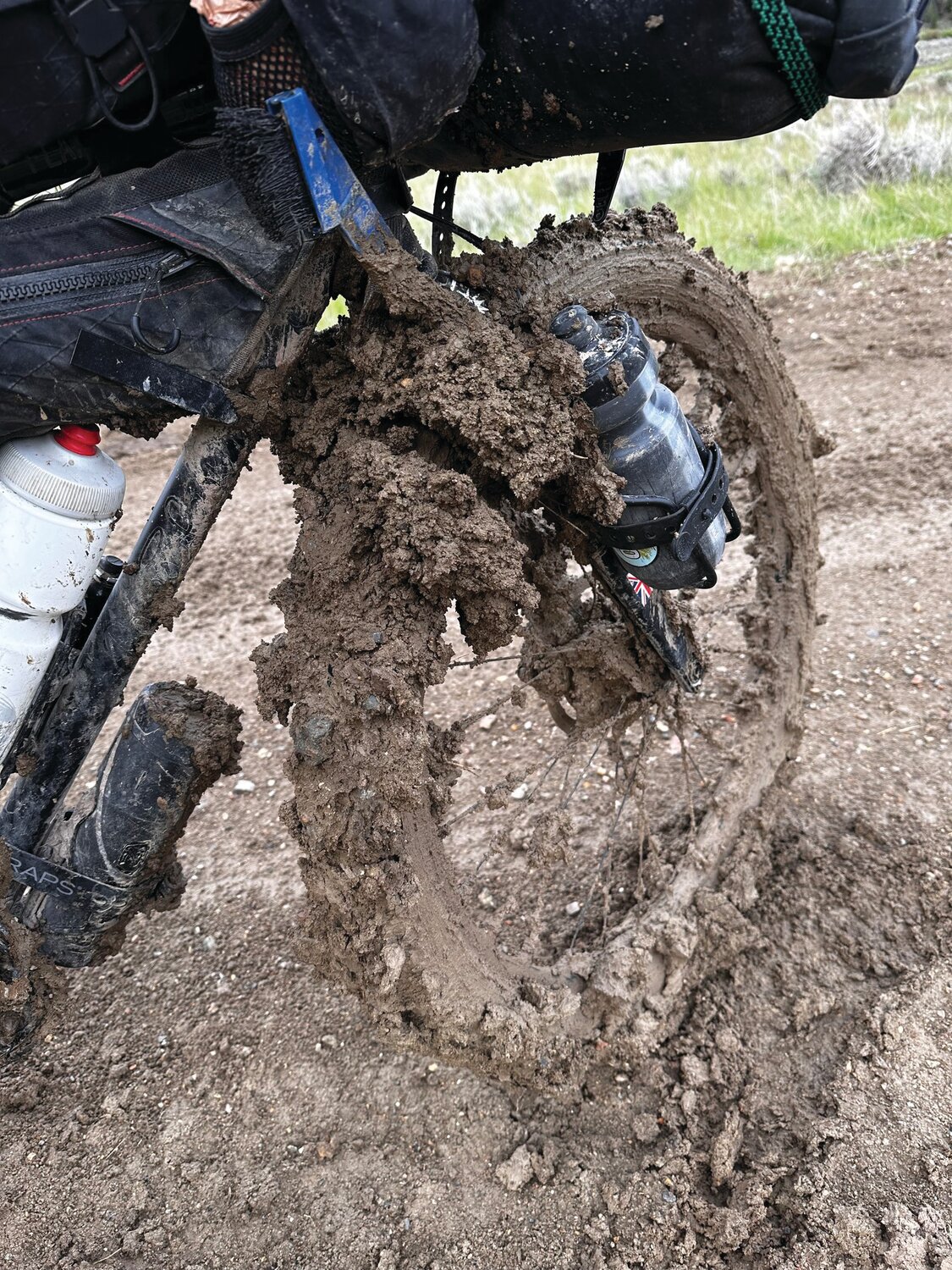 Perkasie’s Mark Gibson slogged through thick mud during the Tour Divide bike race.