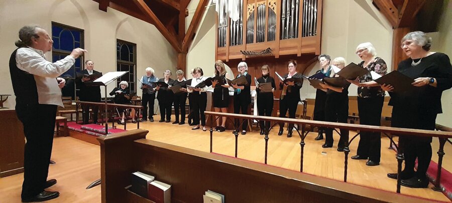New Hope – Solebury & Lambertville Community Choir singers rehearse. The non-auditioned group invites new singers to join them in making a joyful noise.