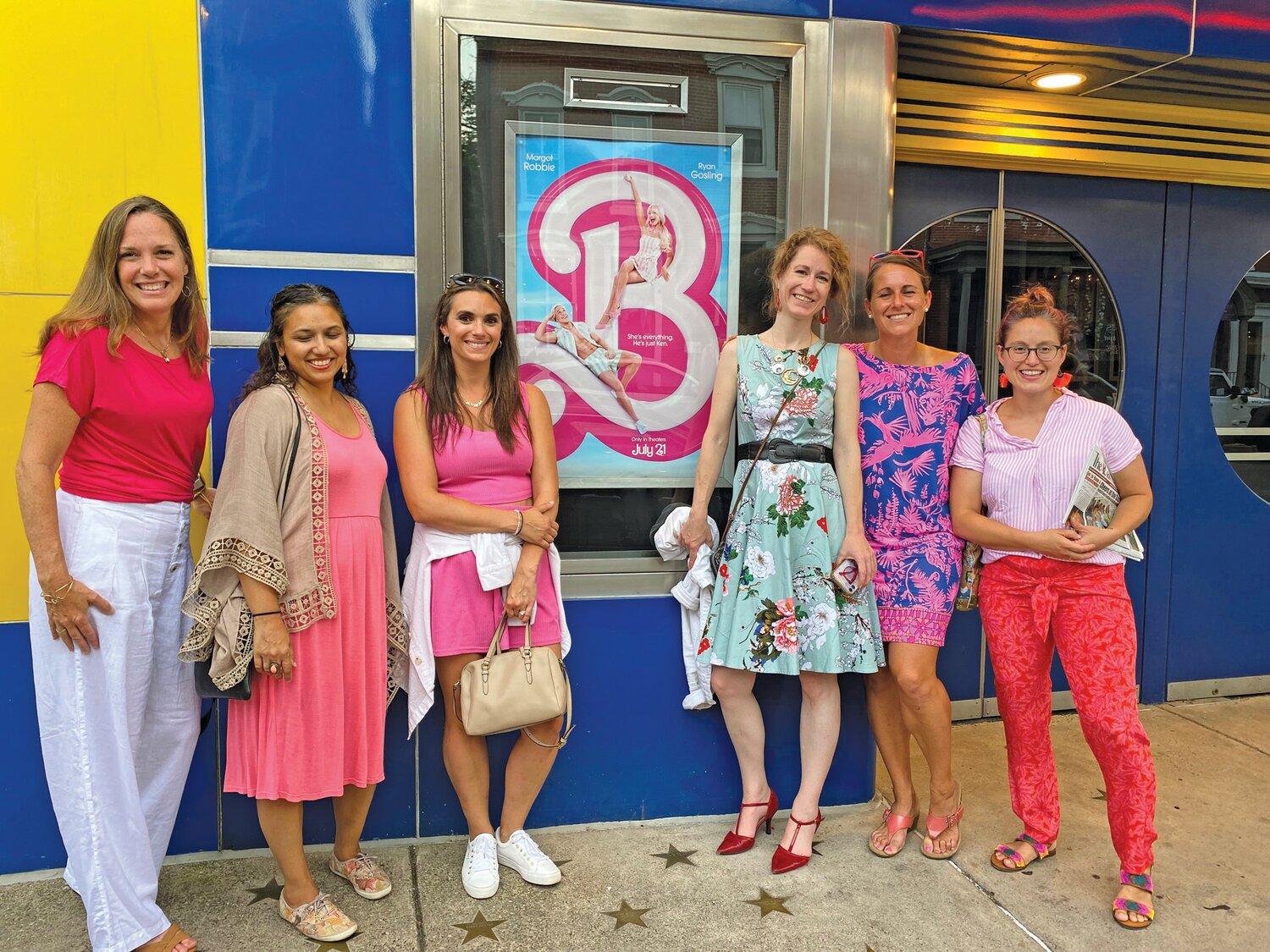 Girls of all ages head to the County Theater to watch “Barbie.”