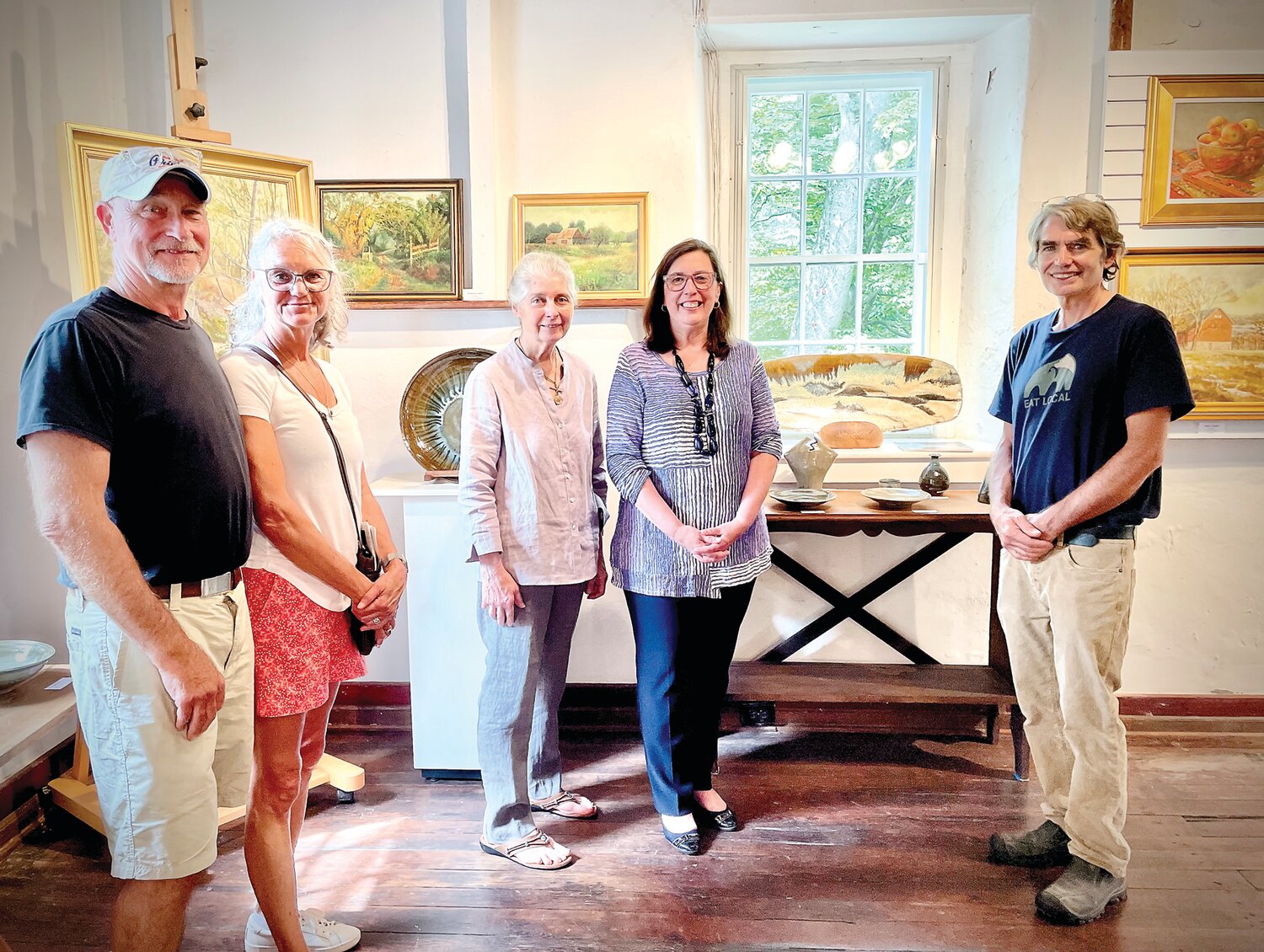 From left are Bill and Laurie Rumsey; artist Dot Bunn; exclusive representative for Dot Bunn Fine Art, Lisa A. Hanson; and potter Willi Singleton.