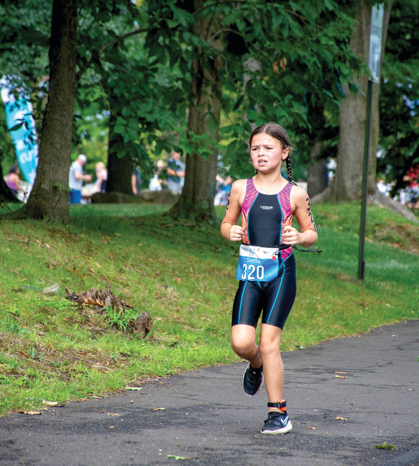 Stella Cecilian legs out the running portion of the Kids Triathlon.