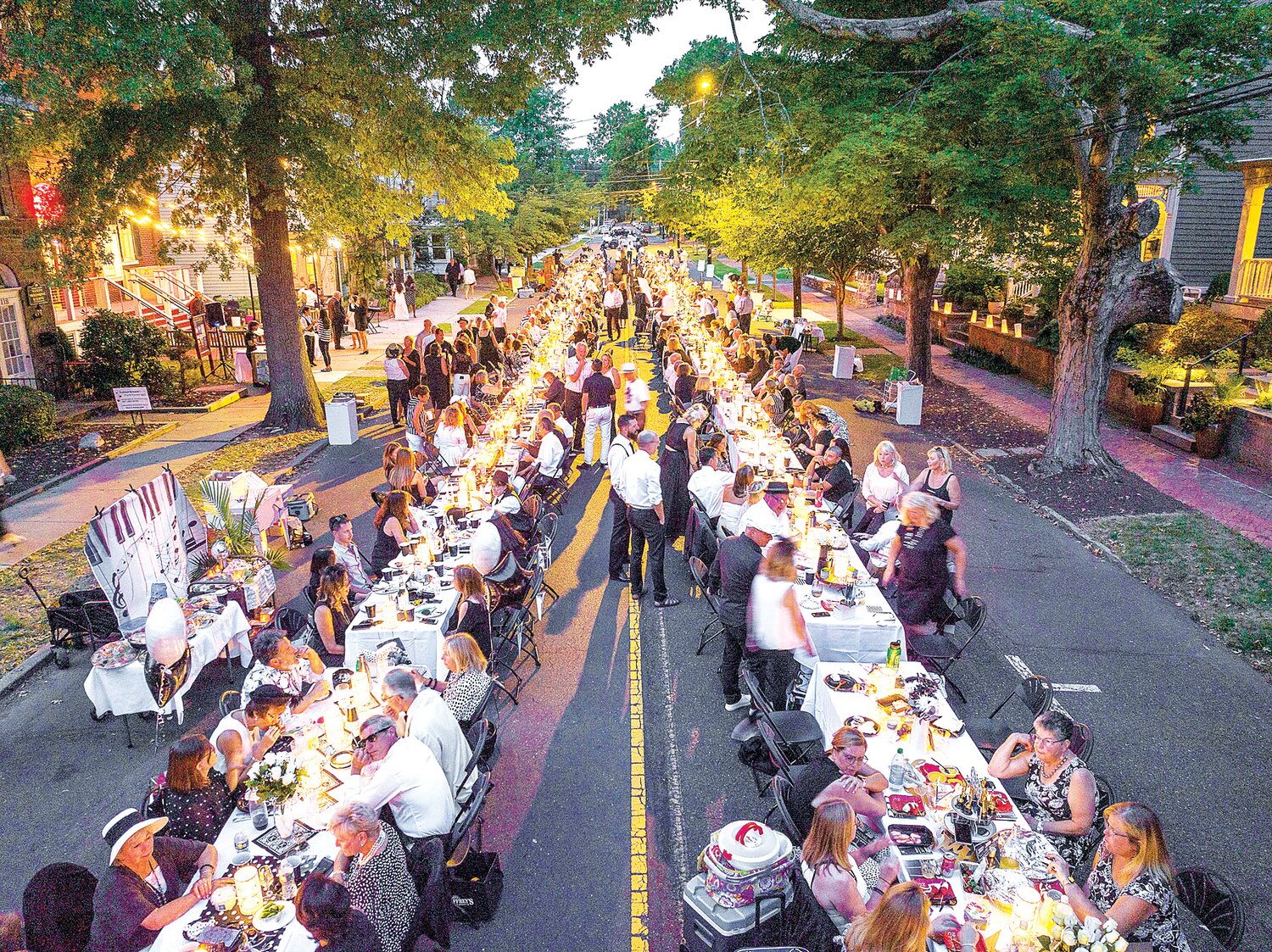 Black-and-white clad diners line North State Street in Newtown Borough for the annual dinner to benefit the Newtown Theatre. Tickets for this year’s event are on sale now.