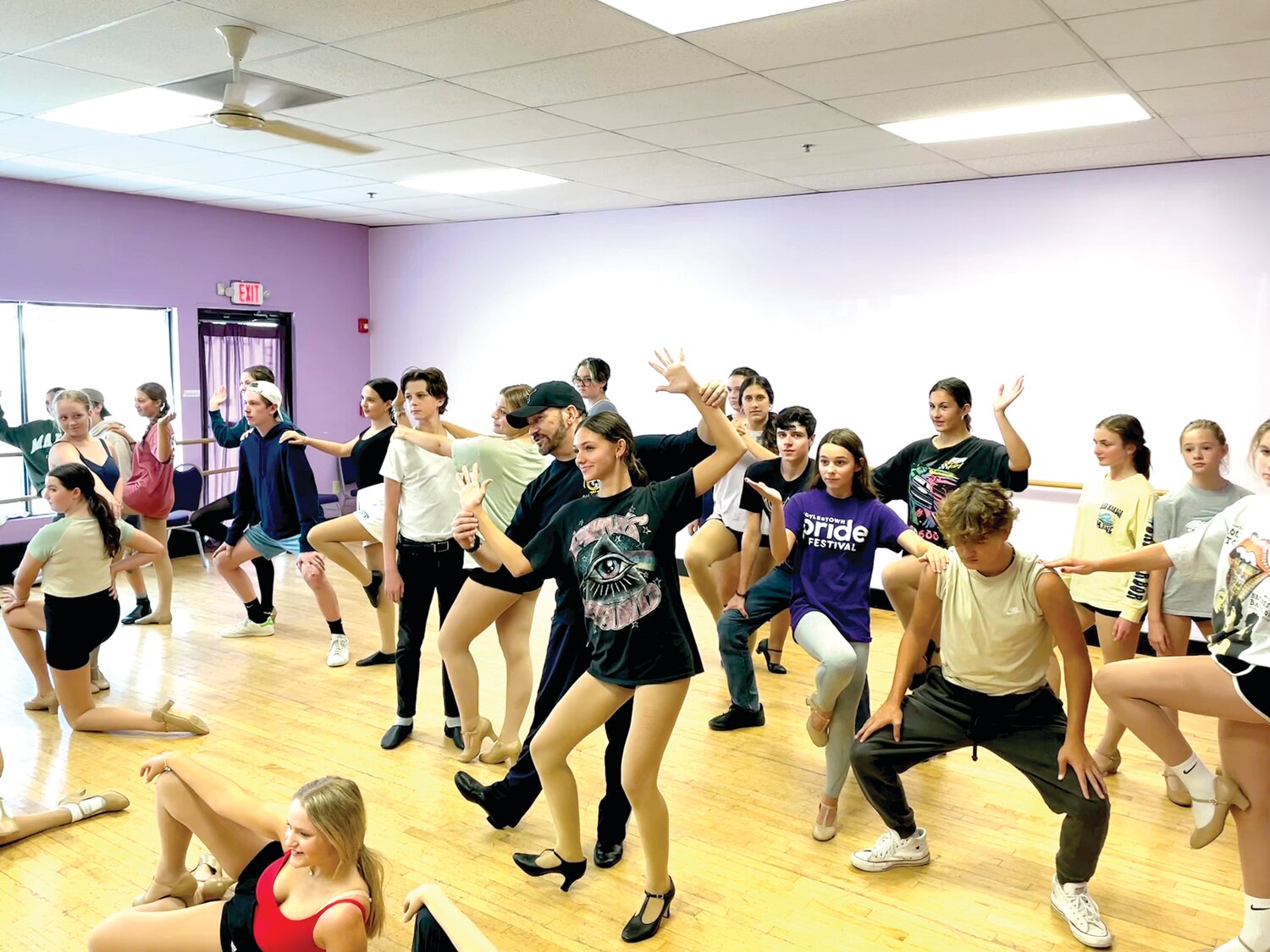 Theatre Arts Center Director/Choreographer Stephen Casey rehearses the cast of “Chicago.”