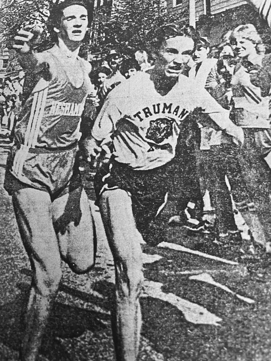 Neshaminy High School’s Bill McCafferty, left, and Harry S. Truman High School’s Eugene “Butch” Oberlander hit the finish line together at the 1983 Mill Street Run. The race was declared a tie.