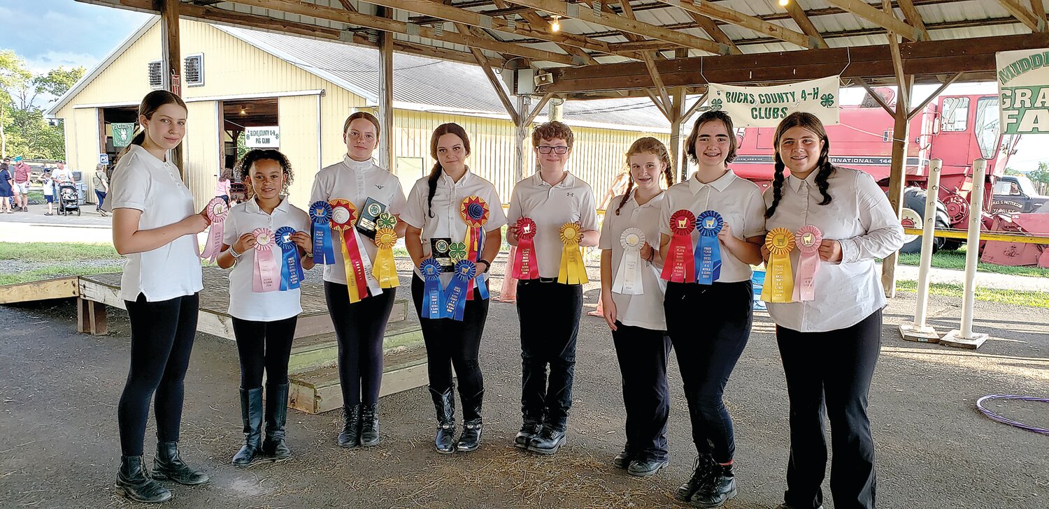 Members of the Pronking Pacas 4-H club participated in competitions at the Middletown Grange Fair in Wrightstown Aug. 16. From left are: Clara Brems, Mia McClease, Grace Lutes, Layla Cotter, David Dutertre, Amelia Sperling, Catherine Vincent and Bryce Snyder.