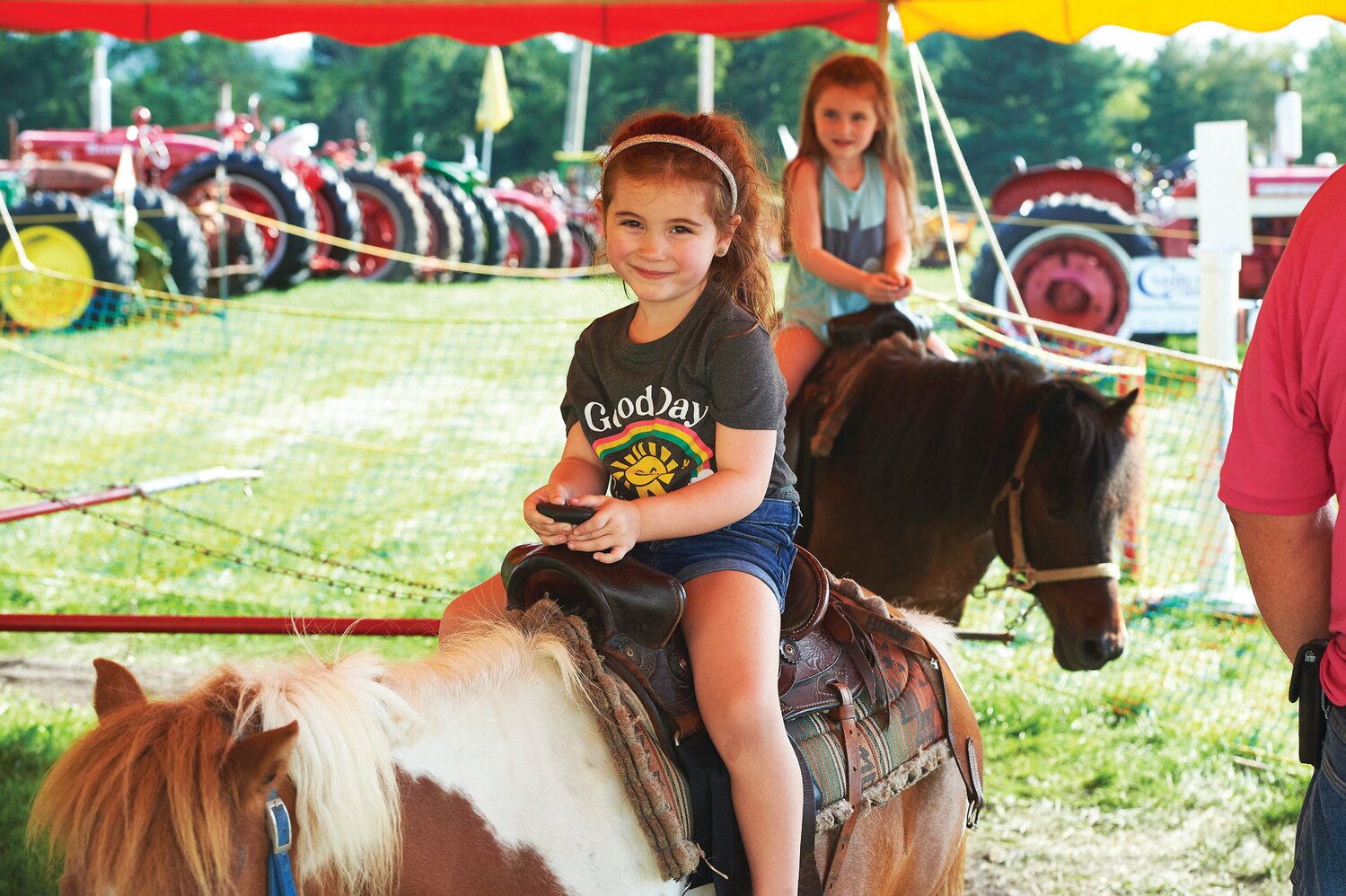 Children ride the ponies at the Middletown Grange Fair in Wrightstown Aug. 17.