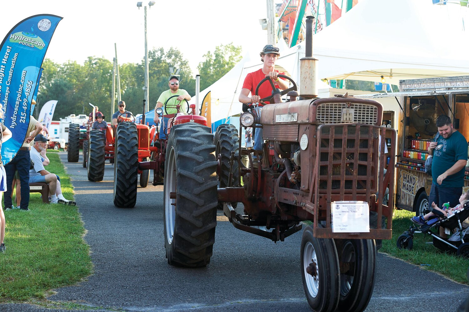 Thomas Dengler on a Farmall tractor during the tractor parade at the Middletown Grange Fair Aug. 17.