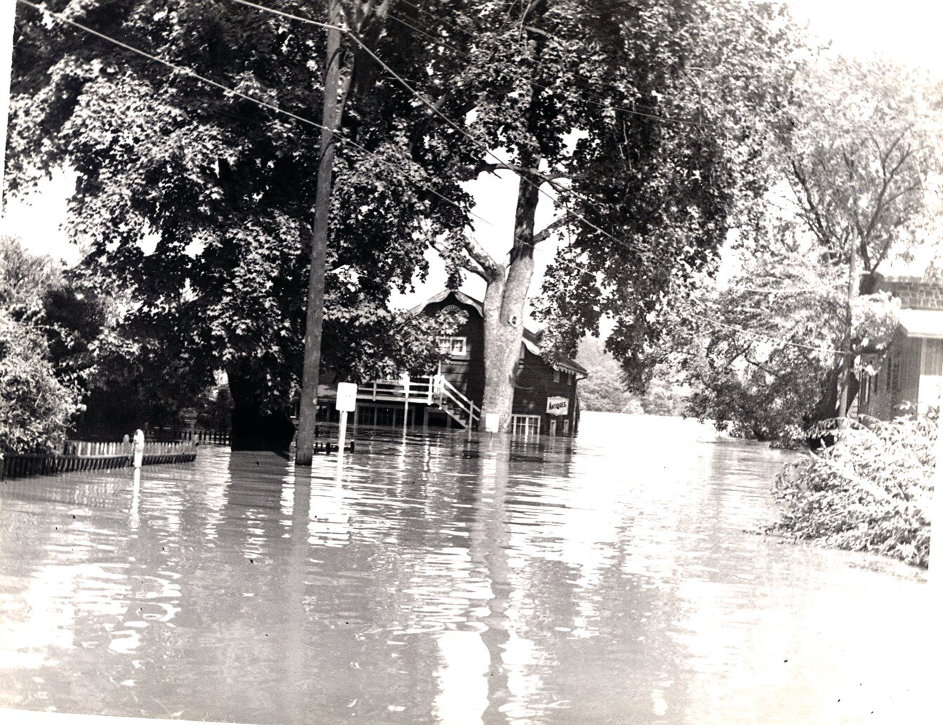 A view of the 1955 flooding at the corner of East Ferry Street and South Main Street in New Hope.