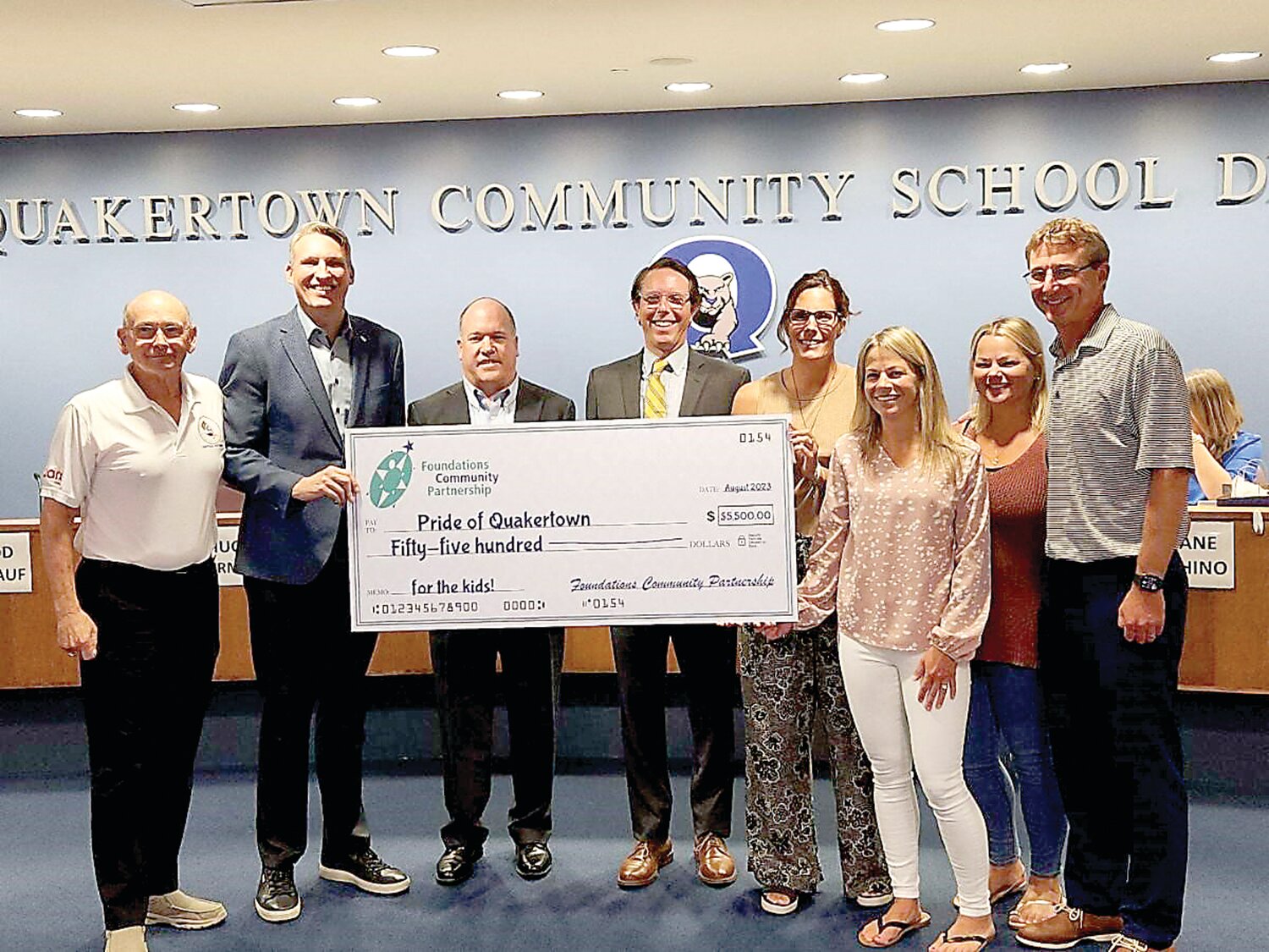 Presenting a grant to Pride of Quakertown are Tobi Bruhn, CEO of Foundations Community Partnerships, second from left, along with Board President Glenn Iosue and Dr. Matthew Friedman, superintendent of the Quakertown Community School District. Accepting the award, from left, are Dan Ross, Leigh Ann Staudenmeier, Jen Reich, Alexis Murphy and Steve Reich.