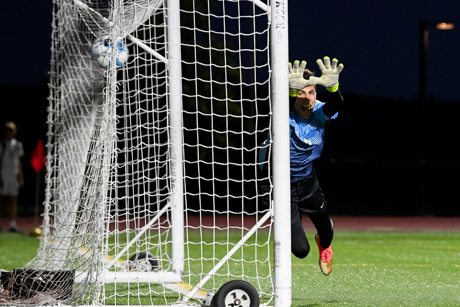 Central Bucks South goalie Beckam Polis makes a diving attempt to stop the third goal of the game during the second half.