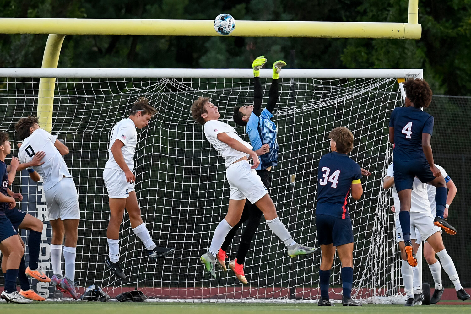 Central Bucks South goalie Beckam Polis clears a corner kick during the first half.