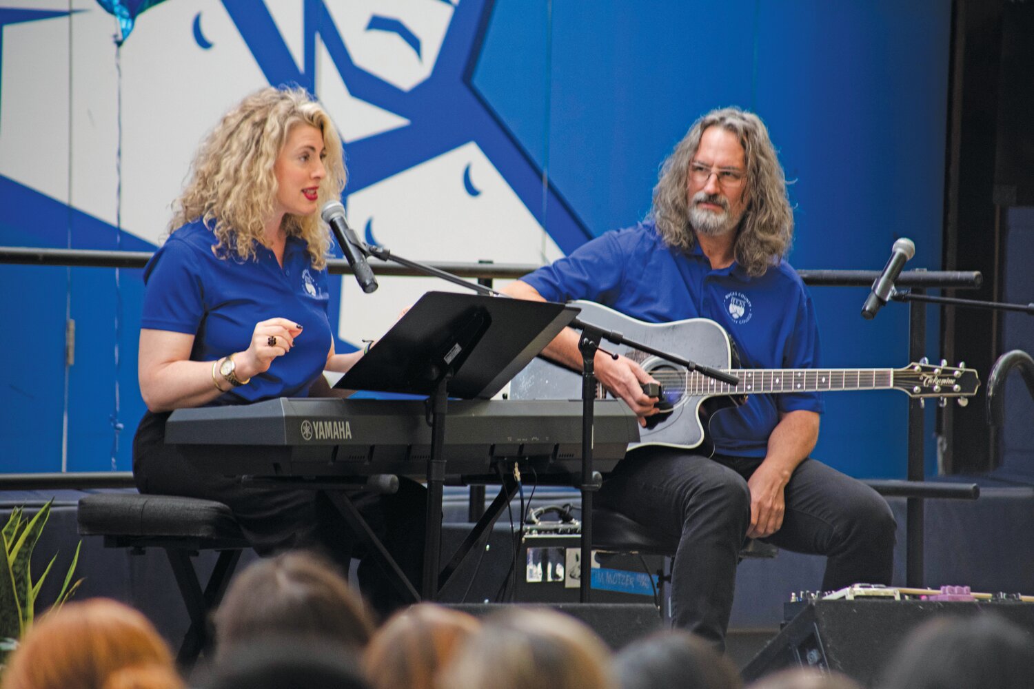 Bucks County native, singer, speaker, emcee, communications consultant, and founder of She Rocked It, Karen Gross, along with Tim Motzer, an accomplished musician who has toured the world, produced his own solo albums, and collaborated on more than 100 others to his credit, performing at the Bucks County Community College President’s New Student Convocation.