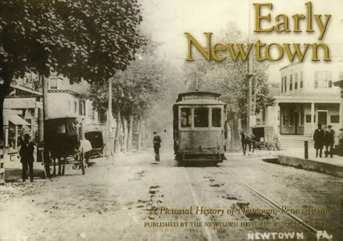 A trolley travels through Newtown Borough in this historical photo.