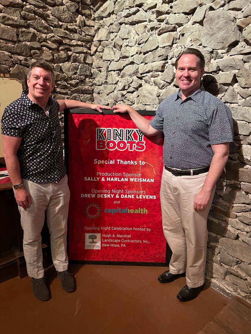 Drew Desky and Dane Levens pose for a photograph on opening night of the Bucks County Playhouse production of Kinky Boots in June 2022. The pair helped sponsor the production
