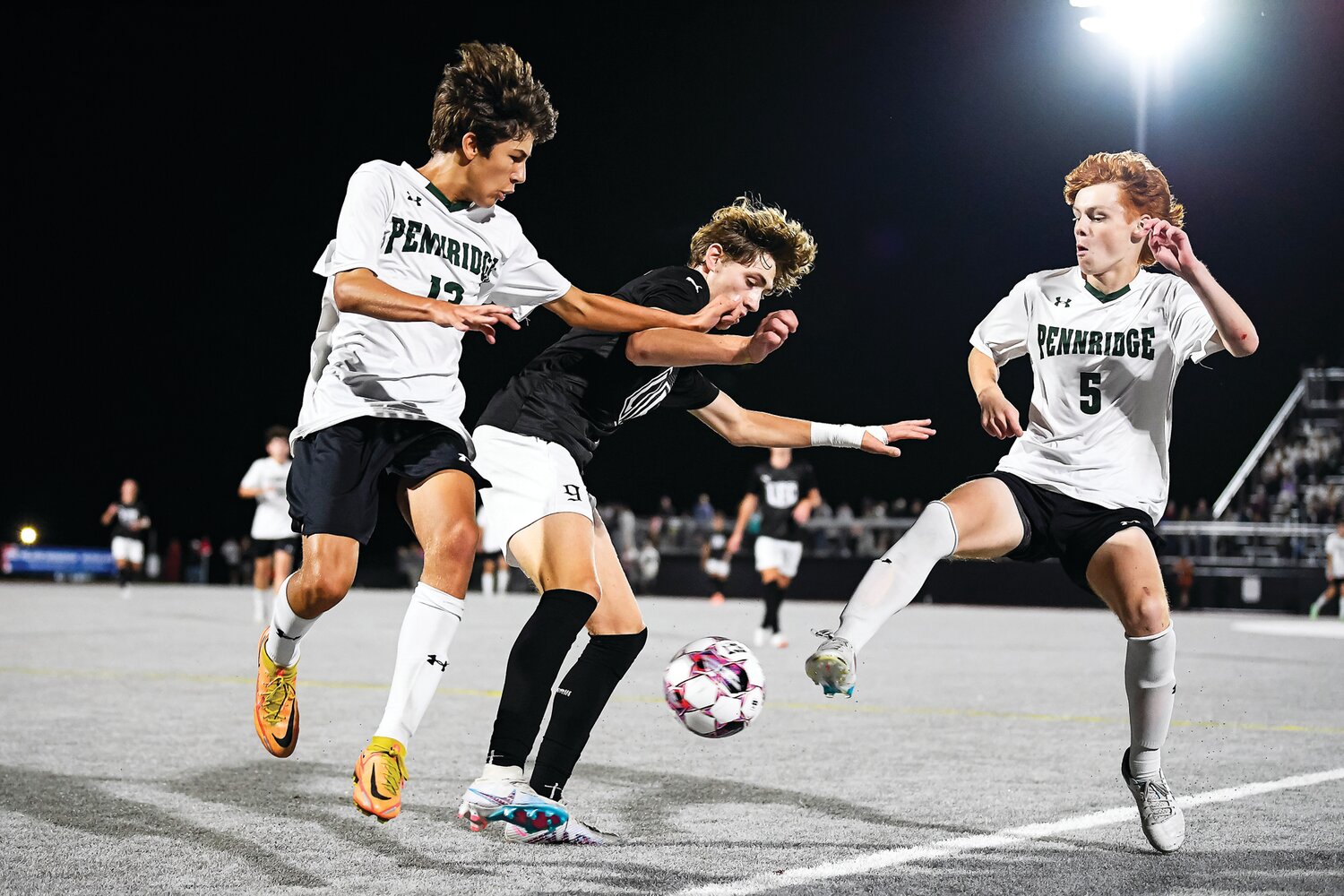 Pennridge’s Parker Annan and Jacks de Meester press on offense as Faith Christian’s Colin Moyer tries to clear the zone in the second half.