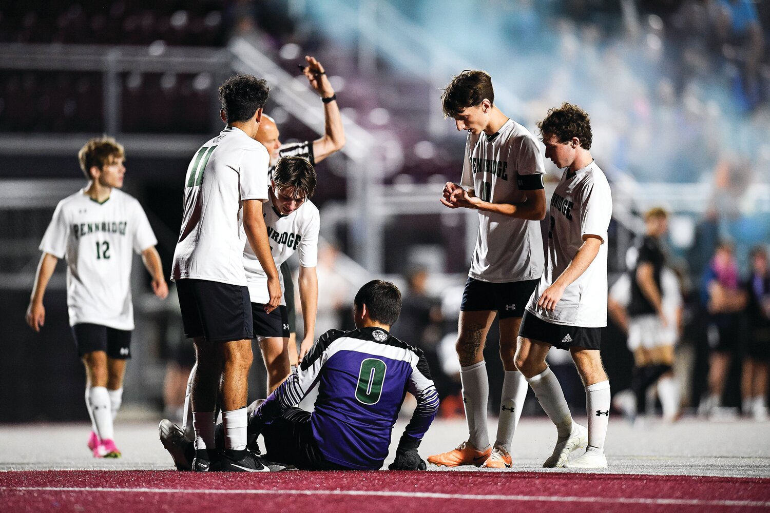 Pennridge goalie Gavin Dimmick is injured in the opening minutes after a goal by FCA. Dimmick would leave the game and return later in the first half.