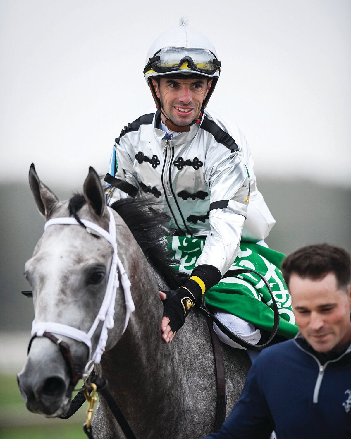 Jockey Florent Geroux pats Saudi Crown after winning the Pennsylvania Derby.
