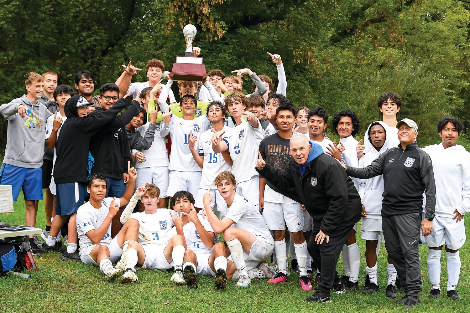 South Hunterdon celebrates with the River Cup trophy after a 4-2 win over Solebury.