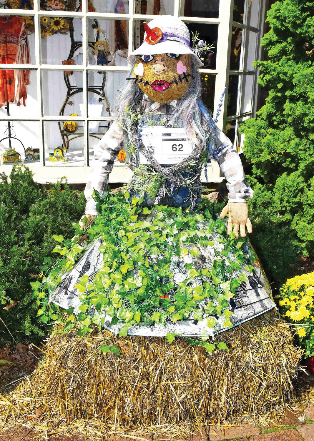 The Jewelry Nest Boutique scarecrow.