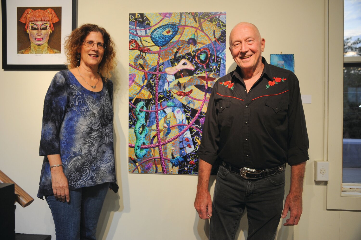 Beth Brody and  Robert Burger with his work, “Organism #2.”