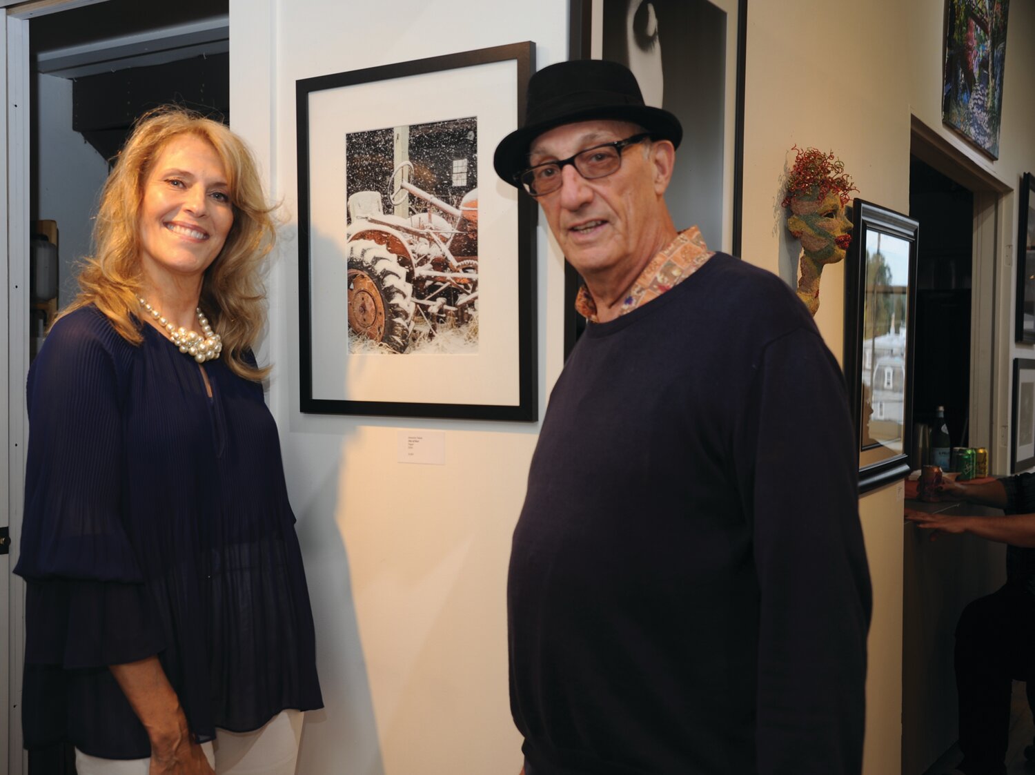 Jeanette Talese with her artwork, “Day of Rest,” and Peter Rosenthal, creative director of Makers Alley and curator of the show.