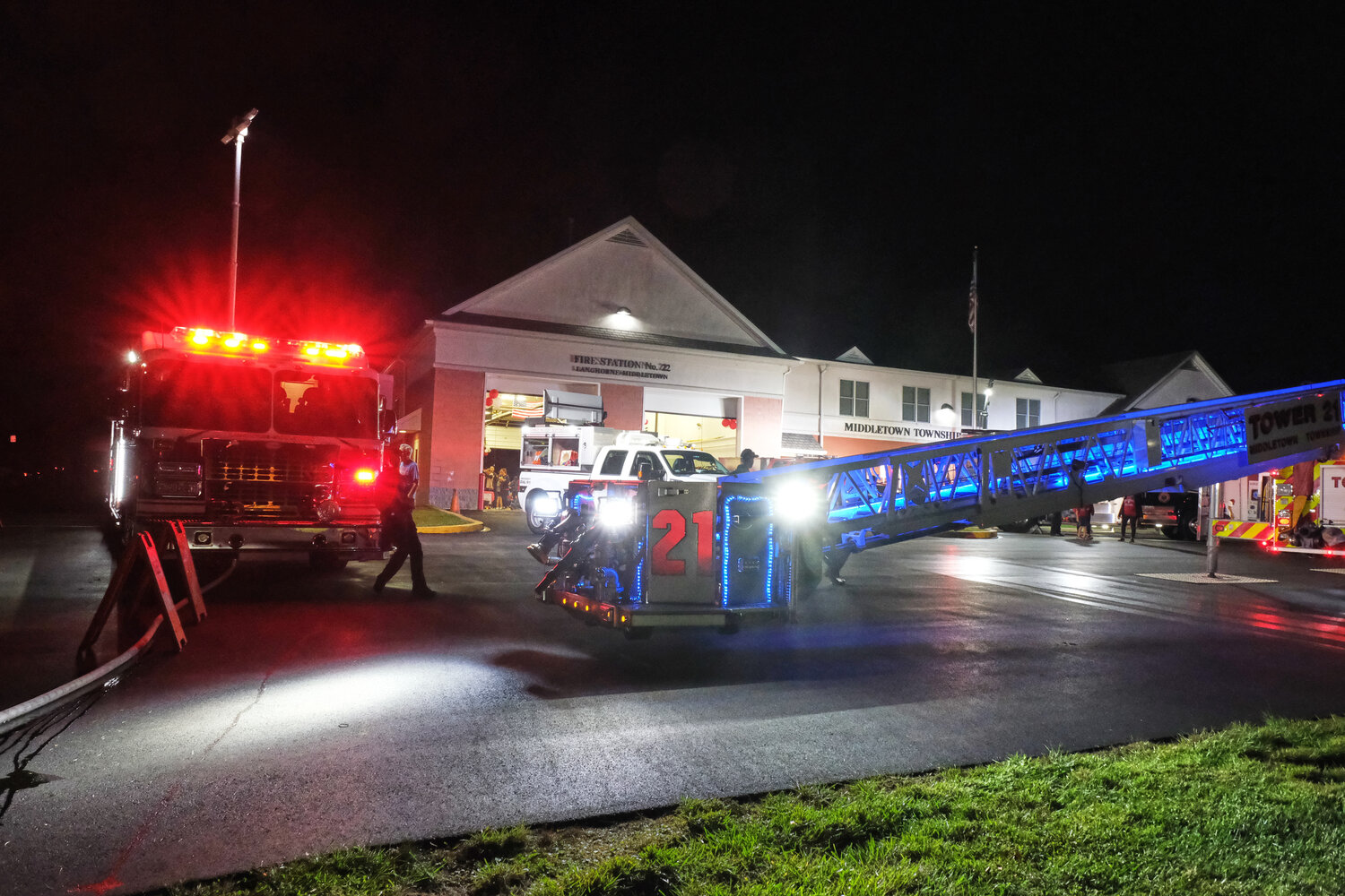 Red, white and blue lights bathe the Langhorne-Middletown Fire Co firehouse in a patriotic glow.
