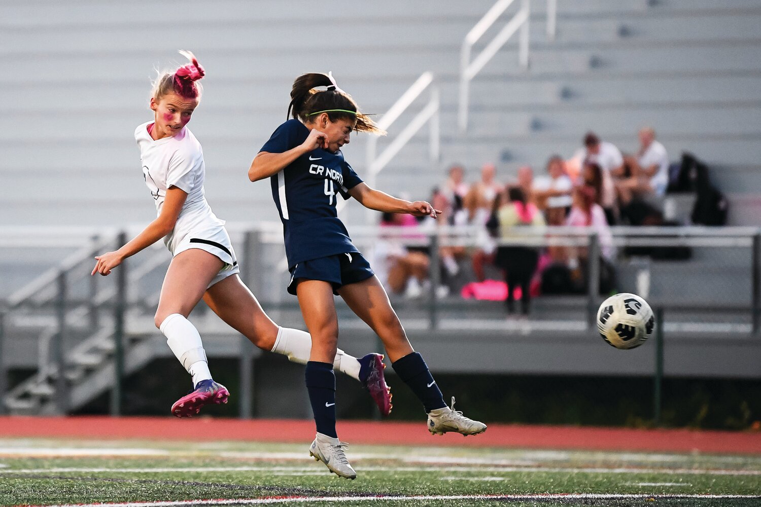 Council Rock South’s Lily Bross directs a shot on goal past Council Rock North’s Isabel Diaz during the first half.