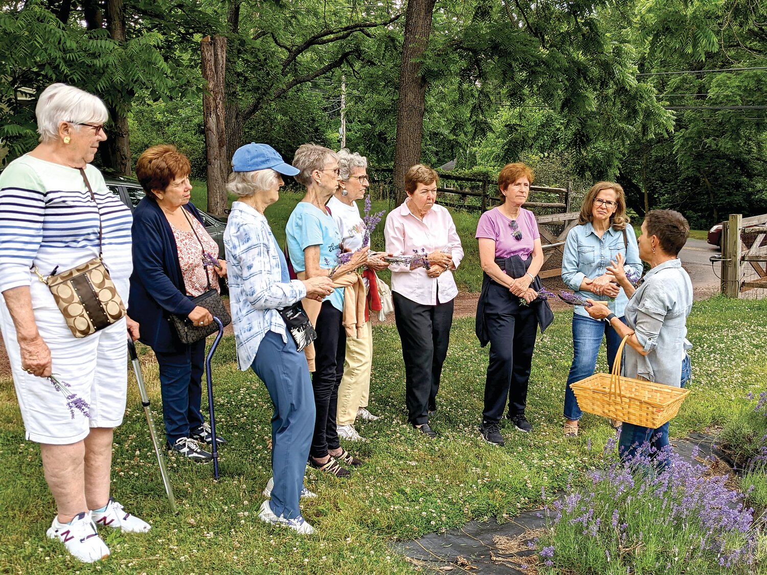 The Ladies of Mt. Carmel enjoyed a picnic at Peace Valley Lavender Farm in warmer weather. Here, they receive an introduction.