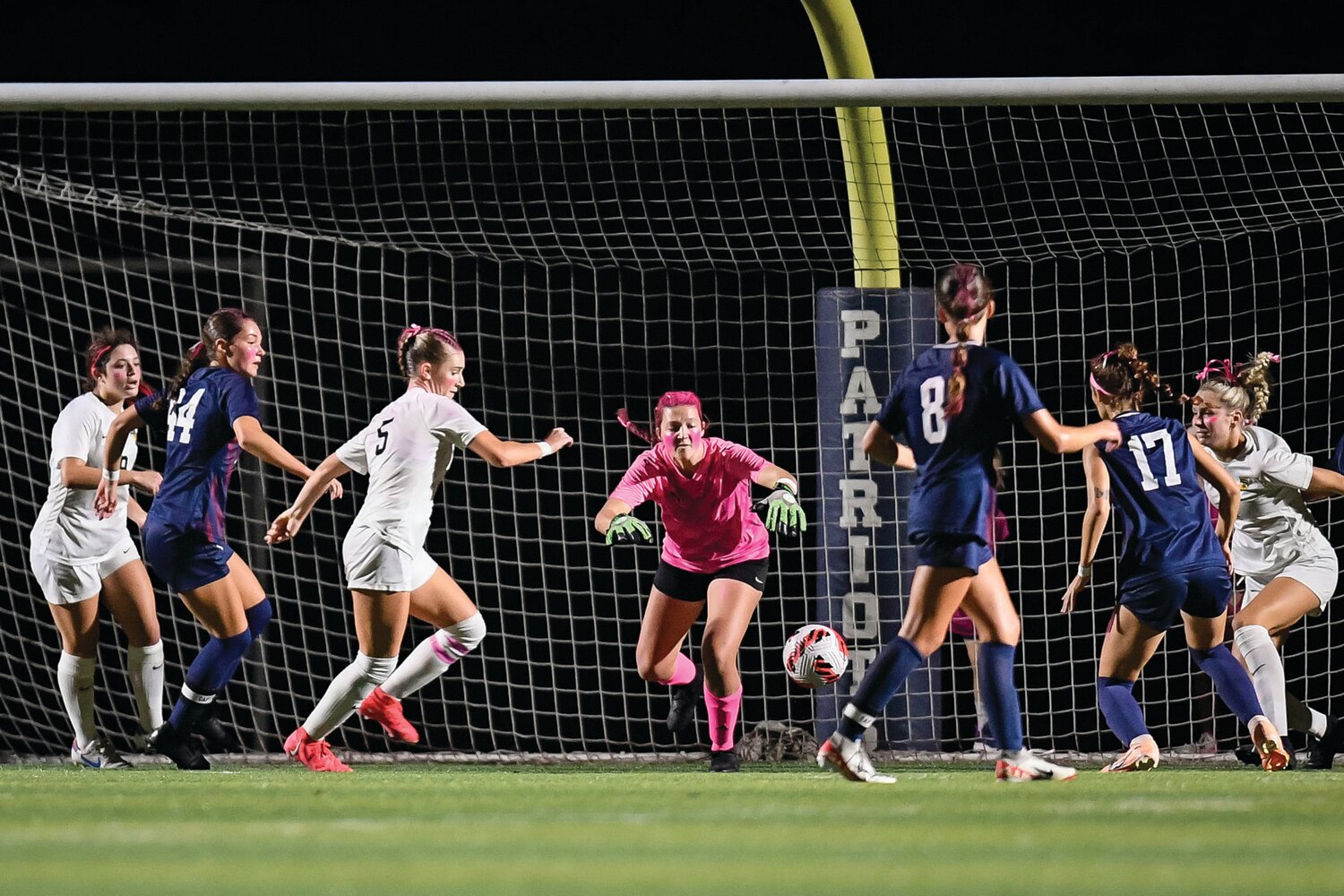 CB East goalie Mae Leedy scrambles to make a save in the second half.
