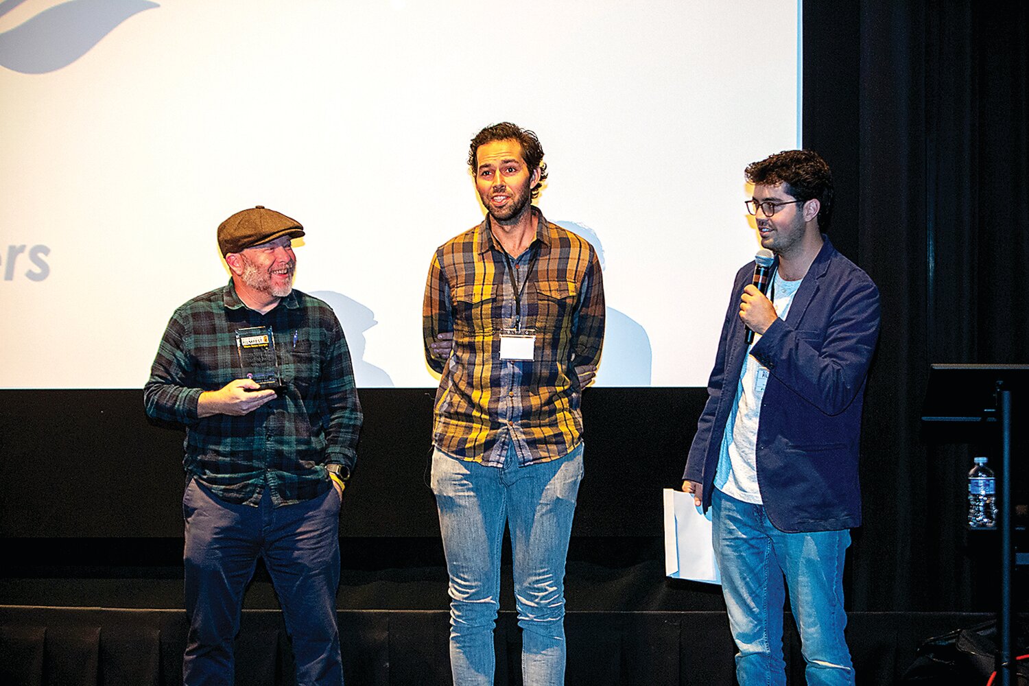 Brian Boger, of Bike Works, Chris Baccash, the subject of “Mountains We Climb” and filmmaker Ryan Canney were recognized at the Bucks Fever FilmFest when Canney’s documentary won “Best of the Fest” on Sunday Oct. 15.