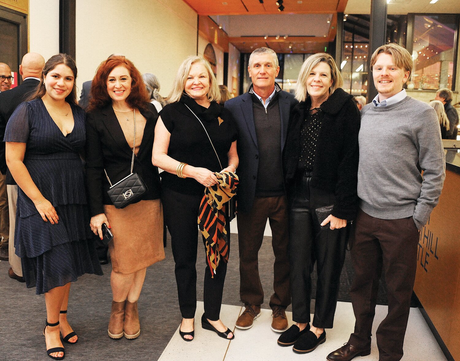 Sarah Claros, Kym Smith, Lin Hadgdon, who chaired the “Cocktails at the Castle” board, Scott Olsen, Nancy Olsen and Jeff Olsen.