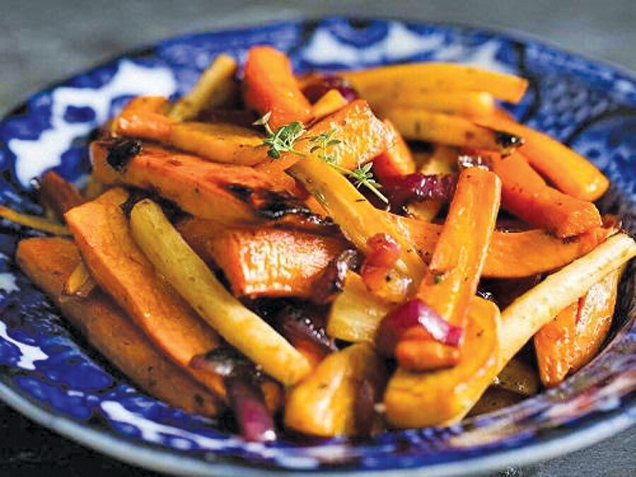 Glazed carrots are a colorful, flavorful side dish for Thanksgiving dinner.